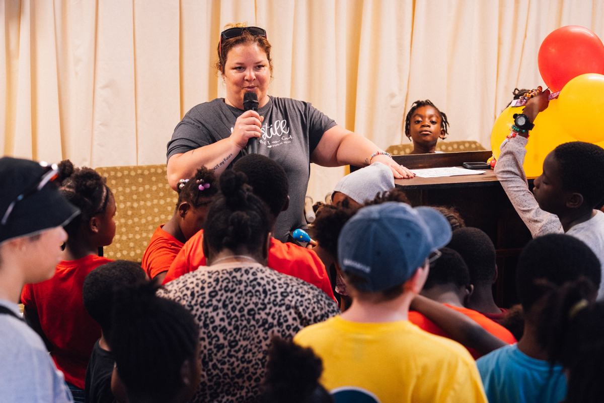 Tidal team member leading kids at a VBS in the Bahamas