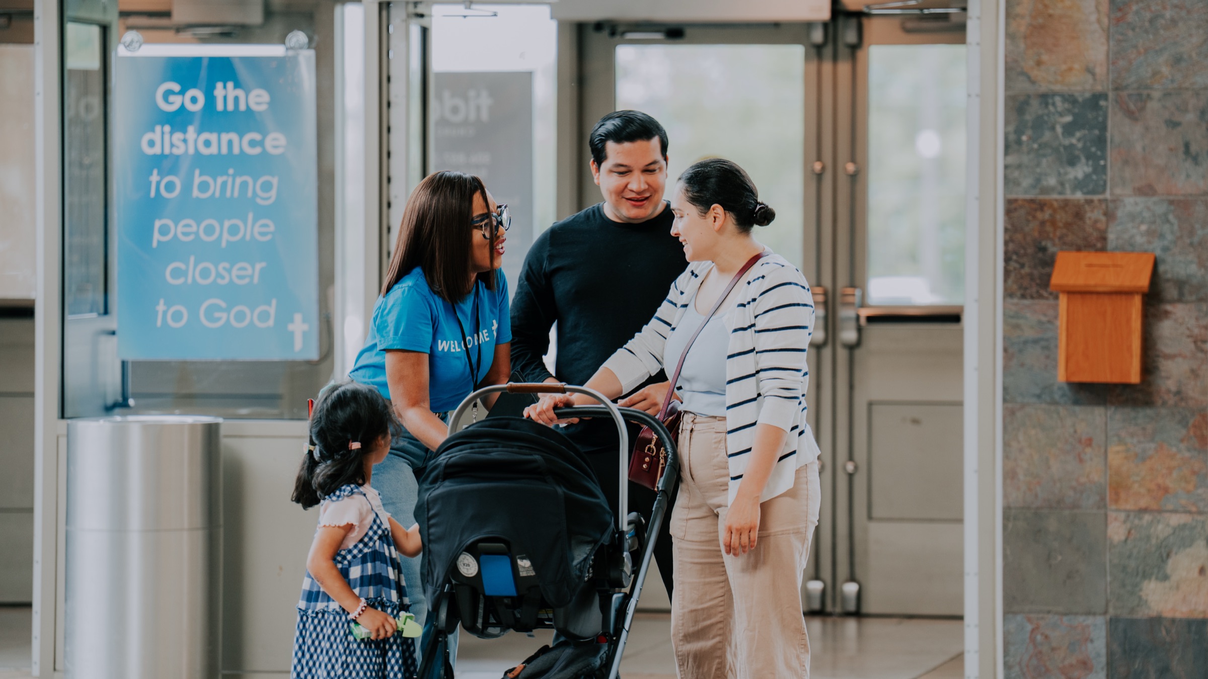 Friends talking before the service at the Moncton campus