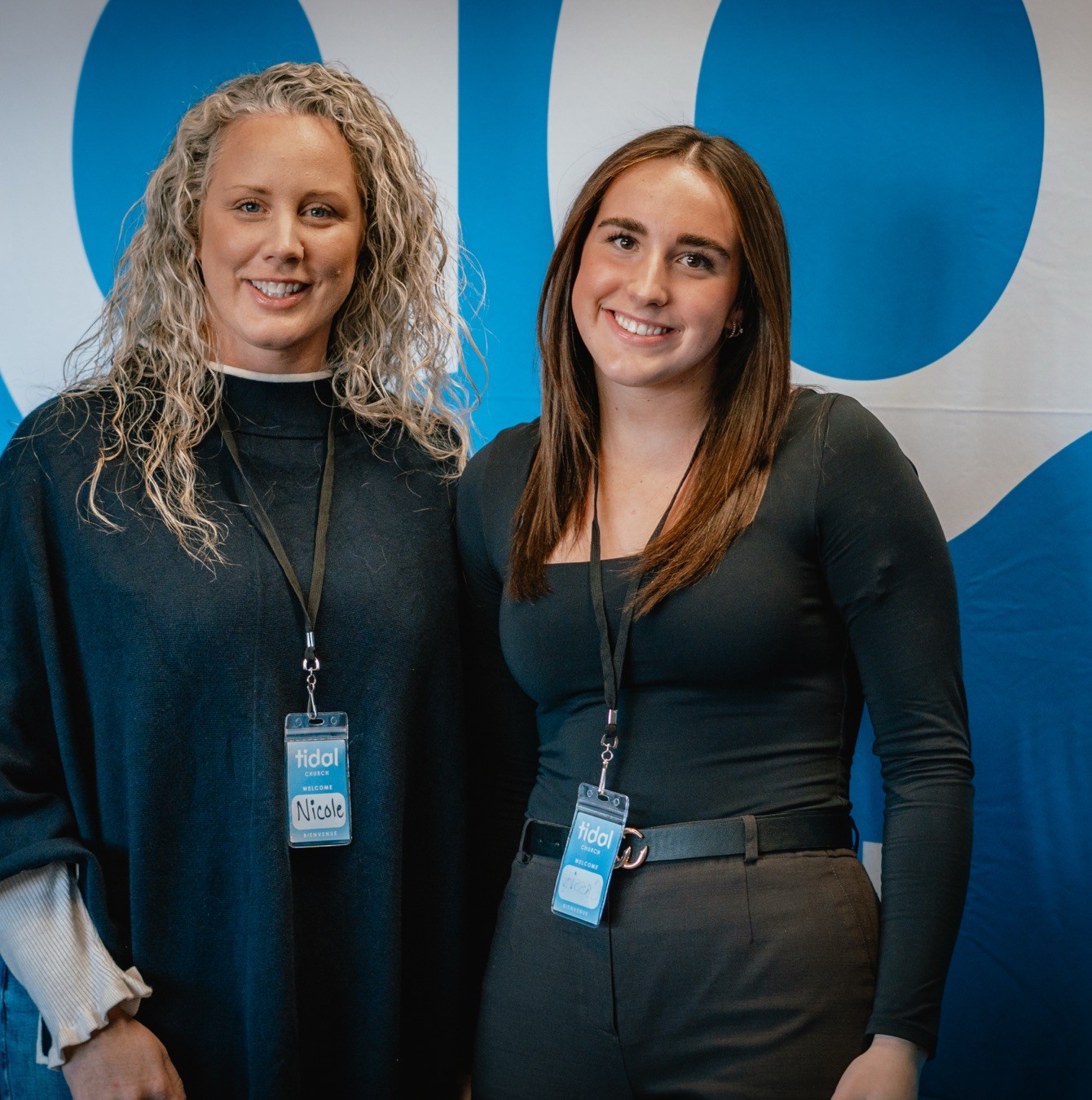 Two members of the welcome team at the Shediac campus