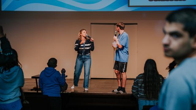Tidal Youth students playing a game on stage