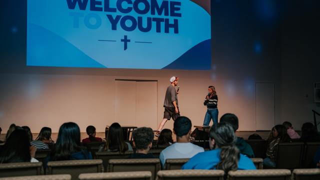 Tidal Youth students playing a game on stage